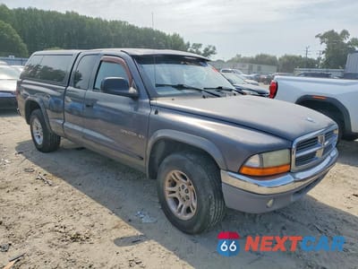 Czwarte zdjęcie samochodu z boku: 2002 DODGE DAKOTA SLT VIN:1B7GL42N92S520002 - miniatura