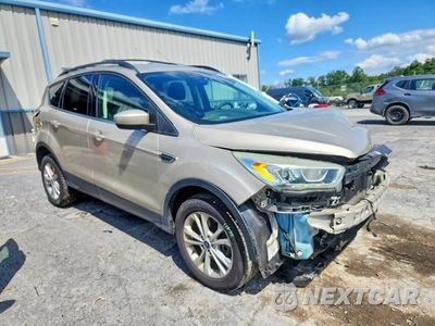 Czwarte zdjęcie samochodu z boku: 2017 FORD ESCAPE SE VIN:1FMCU9GD5HUC17798 - miniatura