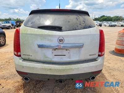 Zdjęcie 6 z 12 samochodu: 2003 CADILLAC SRX VIN:3GYFNKE40AS644489 - miniatura