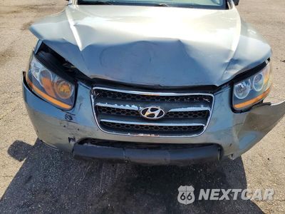 Zdjęcie 12 z 13 samochodu: 2008 HYUNDAI SANTA FE SE VIN:5NMSH13E98H150487 - miniatura