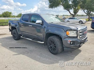 Czwarte zdjęcie samochodu z boku: 2017 GMC CANYON SLT VIN:1GTG5DEN7H1247064 - miniatura