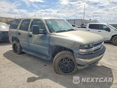 Czwarte zdjęcie samochodu z boku: 2003 CHEVROLET TAHOE C1500 VIN:1GNEC13T13R160985 - miniatura