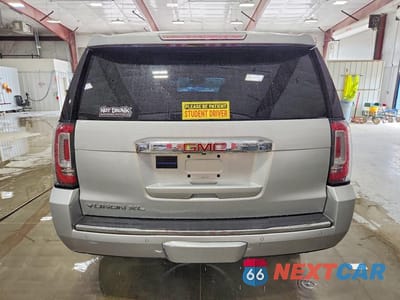 Zdjęcie 6 z 14 samochodu: 2019 GMC YUKON XL DENALI VIN:1GKS2HKJ3KR257549 - miniatura