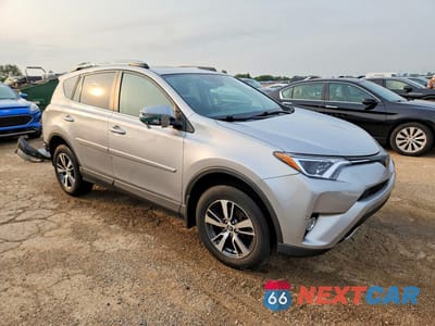 Czwarte zdjęcie samochodu z boku: 2018 TOYOTA RAV4 XLE VIN:2T3RFREV5JW839136 - miniatura