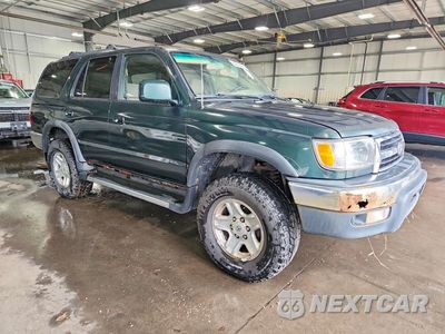 Czwarte zdjęcie samochodu z boku: 1999 TOYOTA 4RUNNER SR5 VIN:JT3HN86R3X0243082 - miniatura