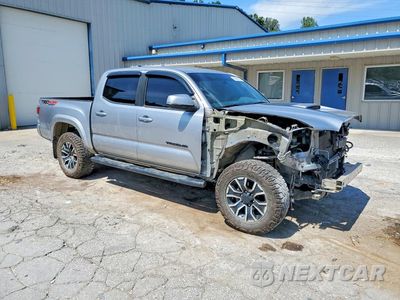 Czwarte zdjęcie samochodu z boku: 2020 TOYOTA TACOMA TRD SPORT VIN:5TFCZ5AN0LX217070 - miniatura