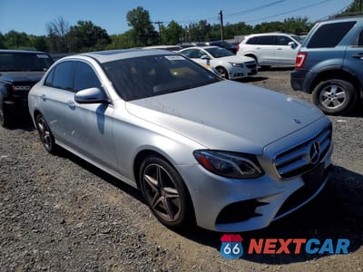 Czwarte zdjęcie samochodu z boku: 2017 MERCEDES-BENZ E 300 4MATIC VIN:WDDZF4KB5HA040131 - miniatura