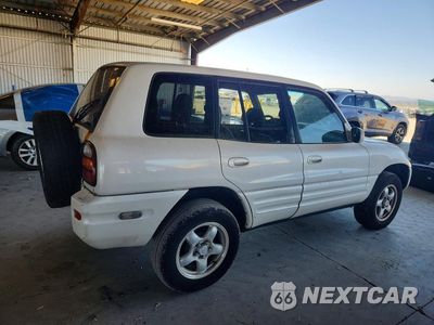Trzecie zdjęcie samochodu z tyłu: 1999 TOYOTA RAV4 BASE VIN:JT3HP10V8X7144157 - miniatura