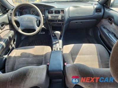 Zdjęcie 8 z 12 samochodu: 1994 TOYOTA COROLLA DX VIN:1NXAE09B9RZ135070 - miniatura