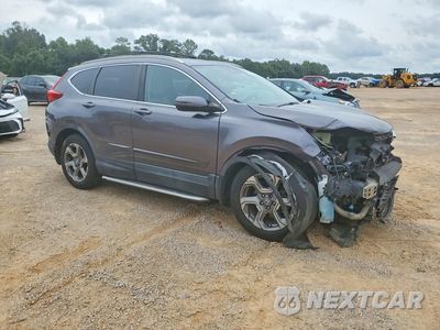 Czwarte zdjęcie samochodu z boku: 2017 HONDA CR-V EXL VIN:7FARW1H80HE005044 - miniatura