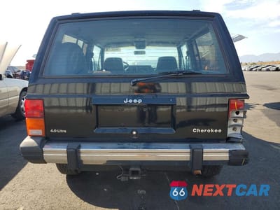 Zdjęcie 6 z 13 samochodu: 1990 JEEP CHEROKEE LAREDO VIN:1J4FJ57L0LL286627 - miniatura