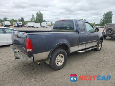 Trzecie zdjęcie samochodu z tyłu: 2000 FORD F150 VIN:1FTRX18L2YNA44491 - miniatura