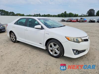 Czwarte zdjęcie samochodu z boku: 2014 TOYOTA CAMRY HYBRID SE VIN:4T1BD1FK4EU121489 - miniatura