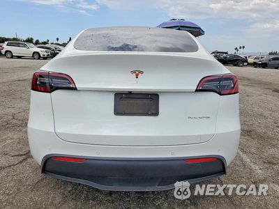 Zdjęcie 6 z 12 samochodu: 2022 TESLA MODEL Y VIN:7SAYGDEE9NF354153 - miniatura
