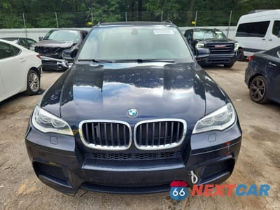 Piąte zdjęcie samochodu w środku: 2013 BMW X5 M VIN:5YMGY0C58D0C11574 - miniatura