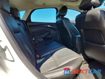 Zdjęcie 10 z 13 samochodu: 2014 FORD FOCUS TITANIUM VIN:1FADP3N21EL281729 - miniatura