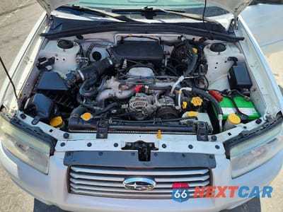 Zdjęcie 12 z 13 samochodu: 2006 SUBARU FORESTER 2.5X VIN:JF1SG63686H734425 - miniatura