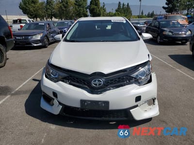 Piąte zdjęcie samochodu w środku: 2016 SCION IM BASE VIN:JTNKARJE5GJ516410 - miniatura