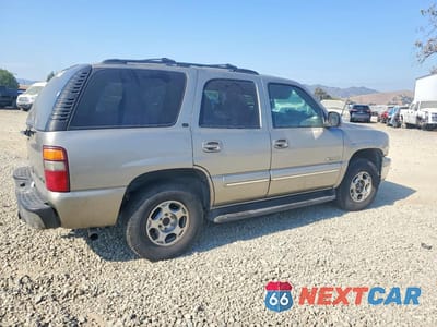 Trzecie zdjęcie samochodu z tyłu: 2002 CHEVROLET TAHOE K1500 VIN:1GNEK13T72R163150 - miniatura