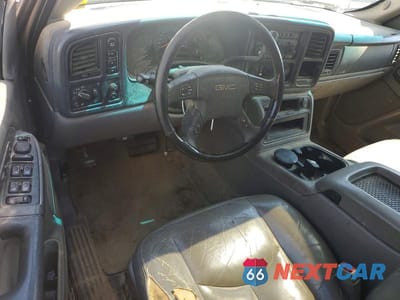 Zdjęcie 8 z 13 samochodu: 2003 GMC YUKON XL K1500 VIN:3GKFK16Z83G301989 - miniatura