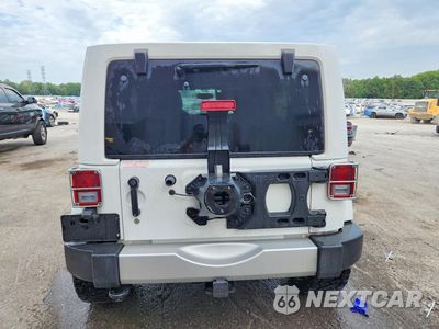 Zdjęcie 6 z 13 samochodu: 2014 JEEP WRANGLER UNLIMITED SAHARA VIN:1C4BJWEG7EL274249 - miniatura