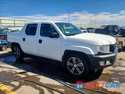 Czwarte zdjęcie samochodu z boku: 2014 HONDA RIDGELINE SPORT VIN:5FPYK1F73EB009427 - miniatura