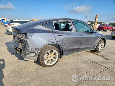 Trzecie zdjęcie samochodu z tyłu: 2023 TESLA MODEL Y VIN:7SAYGDEE8PF868725 - miniatura
