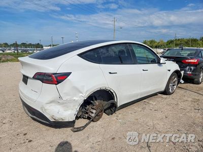 Trzecie zdjęcie samochodu z tyłu: 2023 TESLA MODEL Y VIN:7SAYGDEE7PA054532 - miniatura