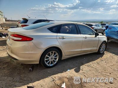 Trzecie zdjęcie samochodu z tyłu: 2017 FORD FUSION SE HYBRID VIN:3FA6P0LU4HR386492 - miniatura