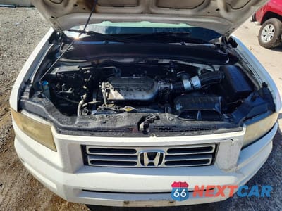 Zdjęcie 11 z 12 samochodu: 2006 HONDA RIDGELINE RTL VIN:2HJYK16506H527025 - miniatura