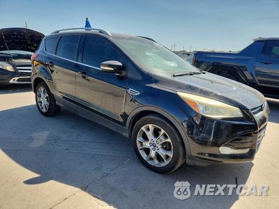 Czwarte zdjęcie samochodu z boku: 2014 FORD ESCAPE TITANIUM VIN:1FMCU9J93EUD52519 - miniatura