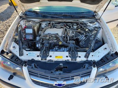 Zdjęcie 11 z 12 samochodu: 2001 CHEVROLET IMPALA VIN:2G1WF55E219289926 - miniatura