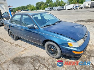 Czwarte zdjęcie samochodu z boku: 1994 TOYOTA COROLLA DX VIN:1NXAE09B9RZ135070 - miniatura