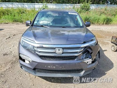 Piąte zdjęcie samochodu w środku: 2017 HONDA PILOT EXL VIN:5FNYF6H62HB104077 - miniatura