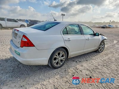 Trzecie zdjęcie samochodu z tyłu: 2012 FORD FUSION SE VIN:3FAHP0HA6CR303614 - miniatura