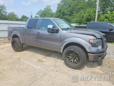 Czwarte zdjęcie samochodu z boku: 2014 FORD F150 SUPERCREW VIN:1FTFW1EF5EFA08644 - miniatura