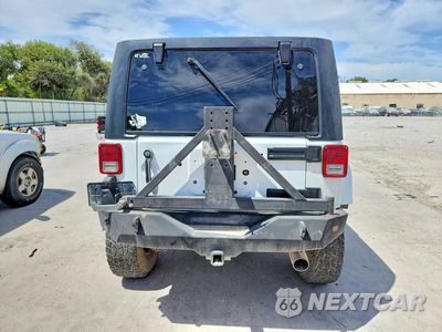 Zdjęcie 6 z 13 samochodu: 2015 JEEP WRANGLER UNLIMITED SAHARA VIN:1C4BJWEG6FL621815 - miniatura