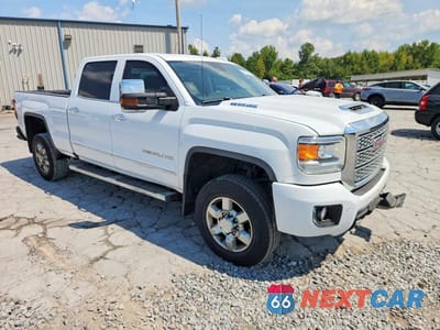 Czwarte zdjęcie samochodu z boku: 2019 GMC SIERRA K3500 DENALI VIN:1GT42WEY1KF240090 - miniatura
