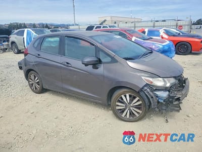 Czwarte zdjęcie samochodu z boku: 2016 HONDA FIT EX VIN:JHMGK5H86GS016233 - miniatura