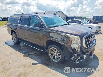 Czwarte zdjęcie samochodu z boku: 2015 GMC YUKON XL K1500 SLT VIN:1GKS2HKC0FR501939 - miniatura
