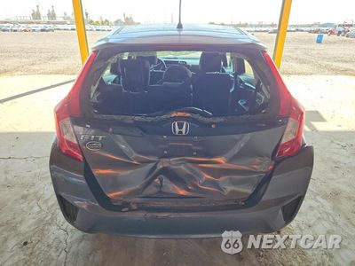 Zdjęcie 6 z 12 samochodu: 2016 HONDA FIT LX VIN:JHMGK5H54GS010369 - miniatura