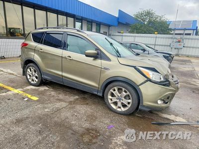 Czwarte zdjęcie samochodu z boku: 2014 FORD ESCAPE SE VIN:1FMCU0GX4EUA48164 - miniatura