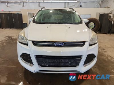 Piąte zdjęcie samochodu w środku: 2015 FORD ESCAPE SE VIN:1FMCU9GX0FUA20805 - miniatura