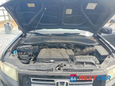 Zdjęcie 11 z 12 samochodu: 2007 HONDA RIDGELINE RTL VIN:2HJYK16597H537053 - miniatura