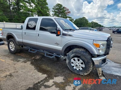 Czwarte zdjęcie samochodu z boku: 2014 FORD F350 SUPER DUTY VIN:1FT8W3BT4EEA59153 - miniatura