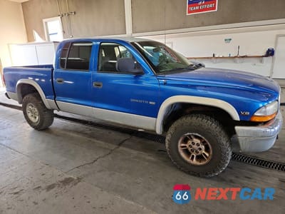 Czwarte zdjęcie samochodu z boku: 2000 DODGE DAKOTA VIN:1B7GG2AN4YS701432 - miniatura