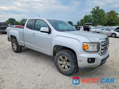 Czwarte zdjęcie samochodu z boku: 2015 GMC CANYON SLE VIN:1GTH5BE37F1230057 - miniatura