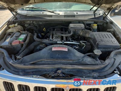 Zdjęcie 12 z 14 samochodu: 2002 JEEP GRAND CHEROKEE LAREDO VIN:1J4GW48S72C249997 - miniatura
