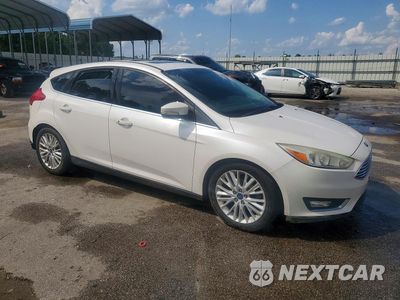Czwarte zdjęcie samochodu z boku: 2017 FORD FOCUS TITANIUM VIN:1FADP3N29HL279523 - miniatura
