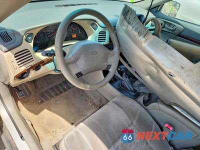 Zdjęcie 8 z 12 samochodu: 2003 CHEVROLET IMPALA VIN:2G1WF55E939199269 - miniatura